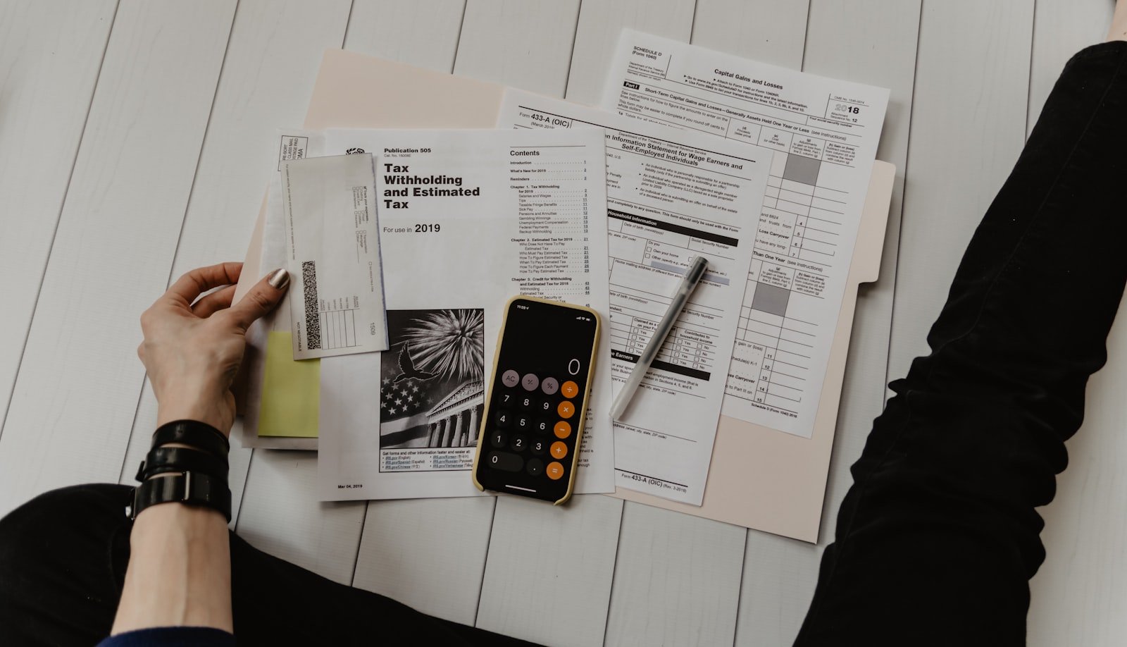 Export paperwork, forms and a calculator on a desk — APEDA registration and compliance